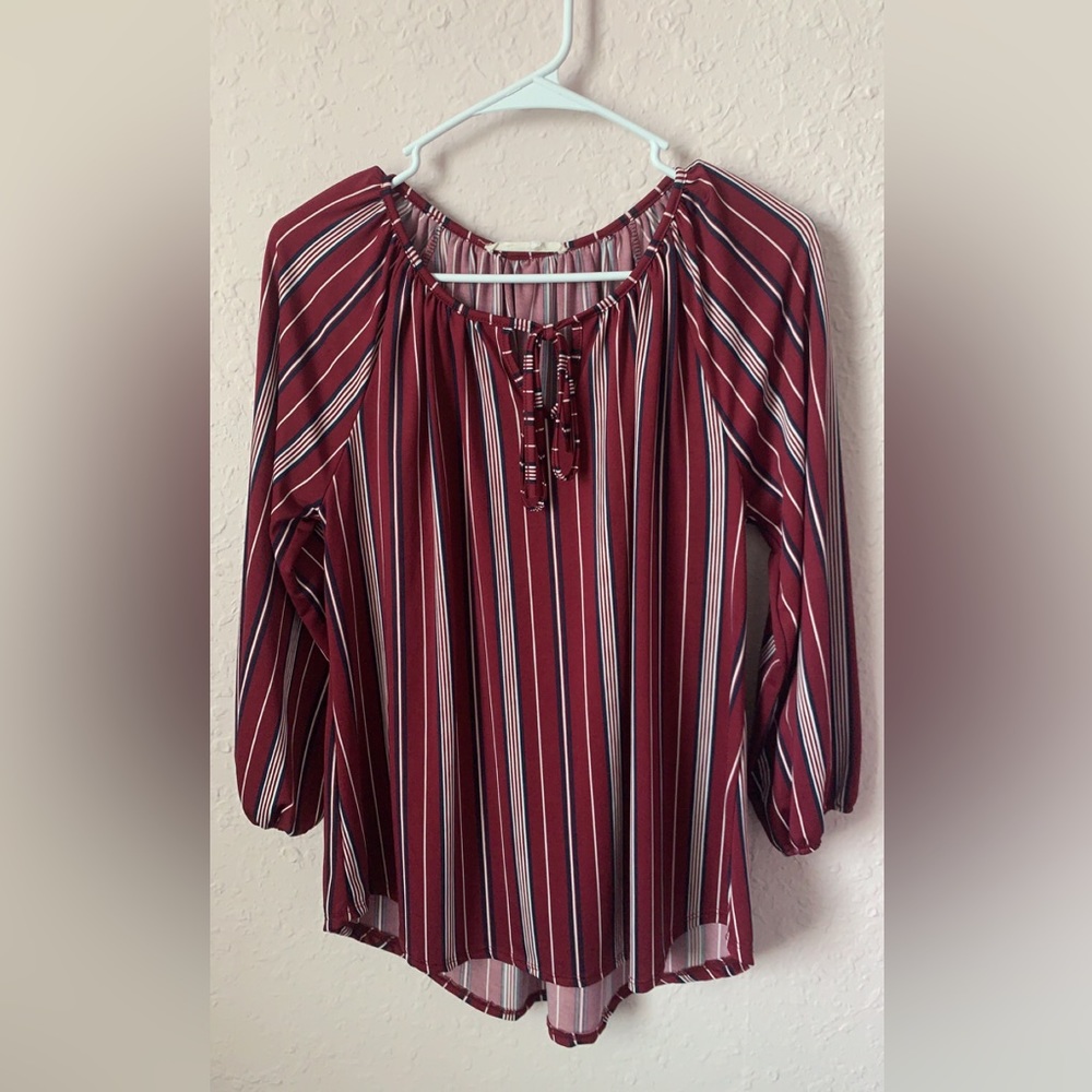 Maroon, navy blue striped blouse.